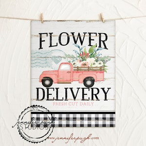 Art print featuring a pink truck and flower delivery typography with floral details