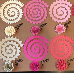 Set of rolled paper flower templates with spiral rosette designs in assorted colors