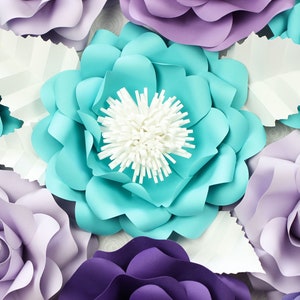 Turquoise layered paper flower with white fringed center