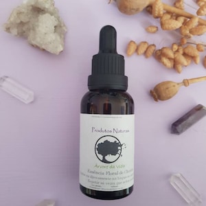 Dark glass dropper bottle with label for flower essence supplement