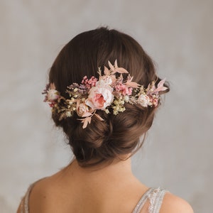 Blush pink bridal hair vine with floral comb, shaped for updos
