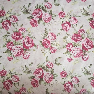 Light pink cotton fabric with red and white rose floral pattern, by the yard
