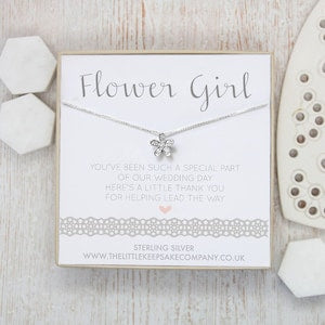 Sterling silver CZ flower necklace with delicate chain and small flower pendant