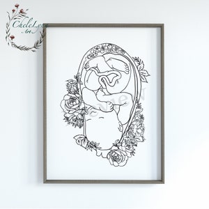 Framed floral pregnancy womb line art print with mother and child figures