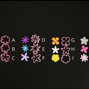 Set of flower-shaped polymer clay cutters for earring studs, with multiple sizes