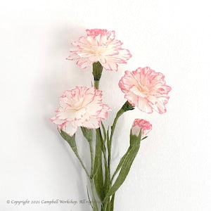DIY crepe paper carnation flower kit: three pink crepe carnations with green stems