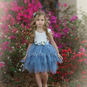 Dusty blue tulle flower girl dress with floral waist detail