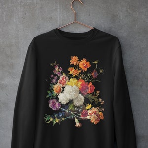 Black sweatshirt with colorful vintage floral bouquet graphic on chest