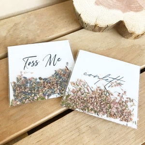Dried flower petal confetti in kraft paper packets for tossing at weddings