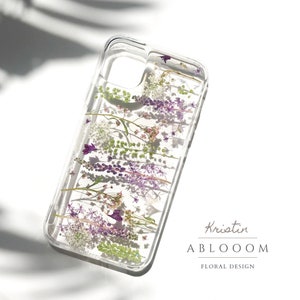 Clear pressed flower phone case with purple and green floral design