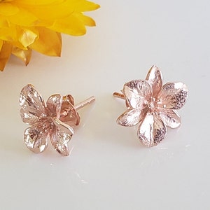 Rose gold plated 925 silver flower stud earrings with four-petal blossom design