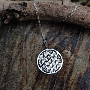 Silver flower of life pendant necklace with round sacred geometry design and chain