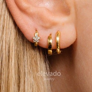 Gold-tone tiny flower hoop earrings with small hinged hoops for cartilage piercings