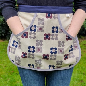 Cotton-linen floral clothes peg apron with blue and gray flower pattern and pocket