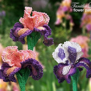 Crochet lace flower applique pattern with pink, purple, and white layered blooms