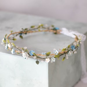 Dusty blue forget-me-not flower crown with white blooms and greenery