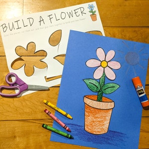 Printable spring flower craft page with blue background and potted flower illustration