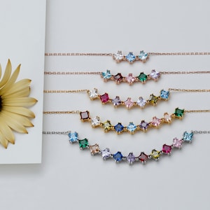 Dainty birthstone necklace set with small multi-color gemstone bar pendants on thin chain