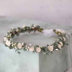 Green eucalyptus flower crown with small white blossoms, flexible bridal headband halo