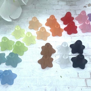 Lucite lily flower beads in assorted colors, translucent flower shapes