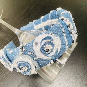 Light blue denim headband with white pearl flower embellishments
