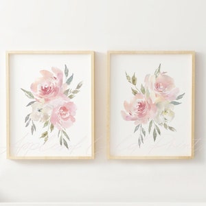 Set of two framed floral wall art prints with pink watercolor roses and green leaves