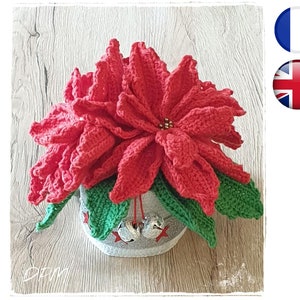 Crochet poinsettia amigurumi flower pattern PDF, red crochet bloom with green leaves