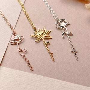 Birth flower vertical pendant necklace with gold- and silver-tone charms
