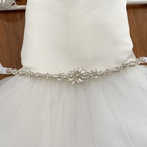 Crystal bead flower girl sash with floral centerpiece