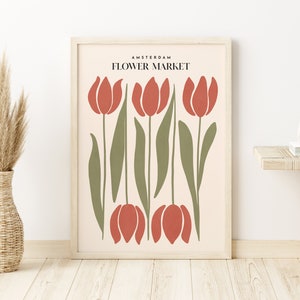 Framed flower market poster print with coral tulips and green stems on a light background