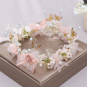 Floral fairy headband wreath with butterflies, pearls, and pink tulle bows