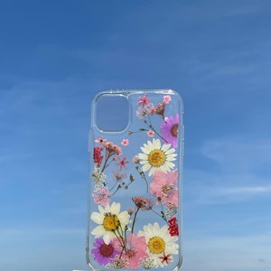 Pressed flowers iPhone case with transparent border and colorful floral print