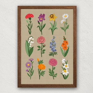 Floral wildflower cross-stitch pattern in a wooden frame, colorful blossoms and stems
