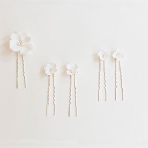 White flower hair pins with small blossoms and long beaded stems, set of 4