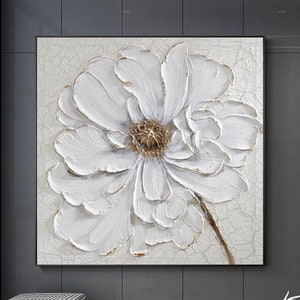 3D white flower canvas wall art with textured petals and gold center