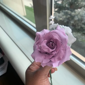 Large custom sugar flower, purple and white layered petals on a short stem