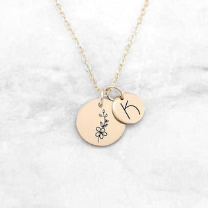 Round birth flower pendant necklace with two disc charms on a gold-tone chain