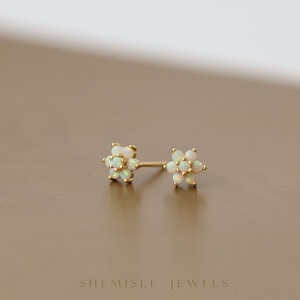 Opal flower stud earrings with gold posts, small white opalescent floral studs
