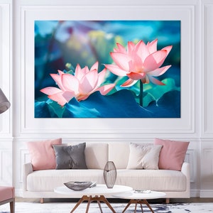 Framed lotus flower canvas wall art with pink blossoms on blue background