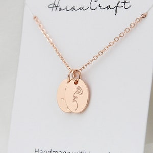 Rose-gold oval disc birth-flower pendant necklace with fine chain