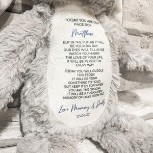 Personalised bunny teddy plush toy with thank-you message card on gray fur