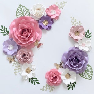 Pastel paper flower wall decor set with layered roses, small blossoms, and green leaves