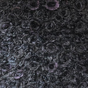 3D artificial flower wall panel with dark blooms and subtle violet accents