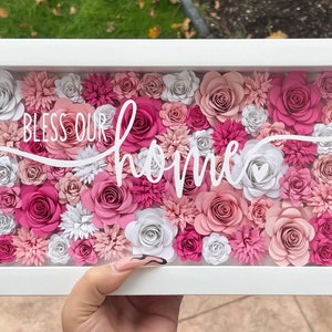 Rose flower shadow box with pink and white blooms and cursive text 'Bless our'