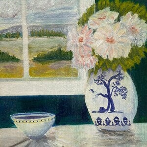 Framed still life painting of a blue Chinese vase with pink flowers on a table