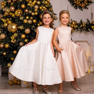 Girls ivory satin flower girl dress, sleeveless ball gown with gathered skirt