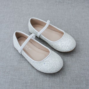 Glitter Mary Jane flats with ankle strap and round toe, light silver-white