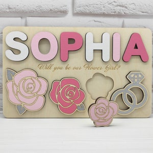 Personalized name puzzle with Sophia, rose pieces and 'Will you be our Flower Girl' text
