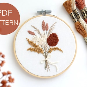 Dried flowers embroidery pattern in a hoop, stitched bouquet with brown and cream thread