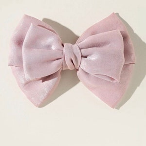 Large pink knot bow hair clip with satin ribbon loops